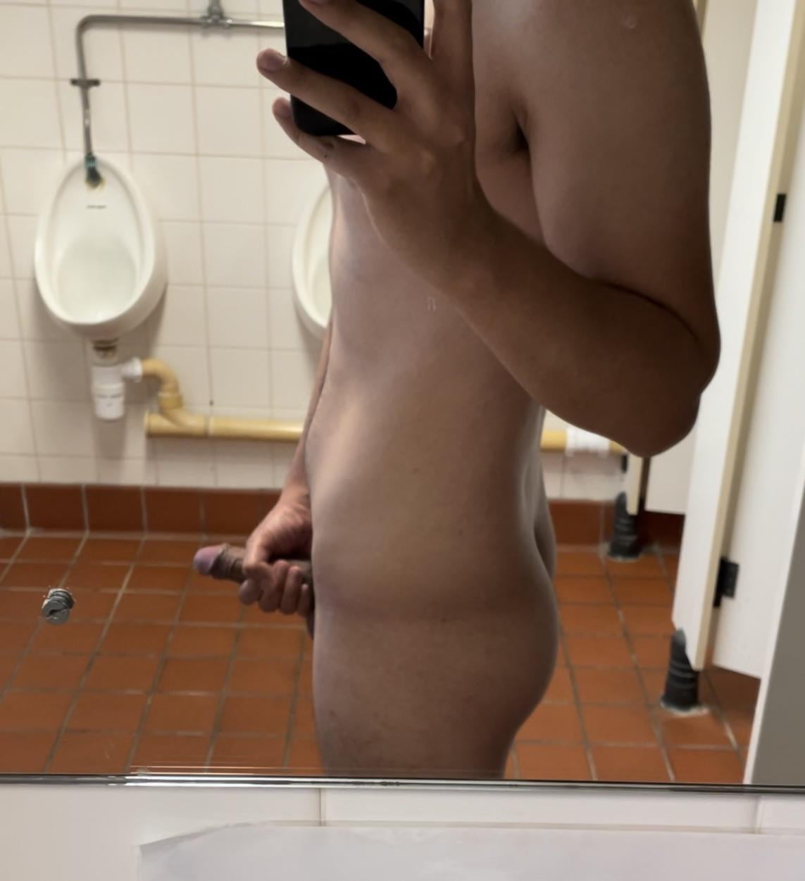 Fully naked at the urinals